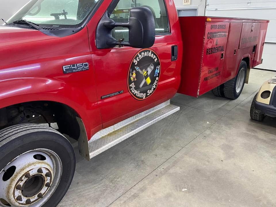Schneider's Plumbing Service truck